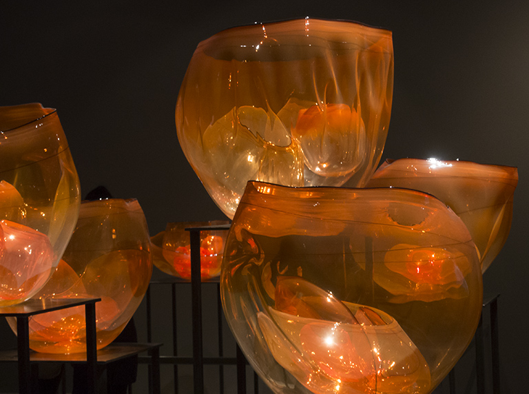 Chihuly orange bowls