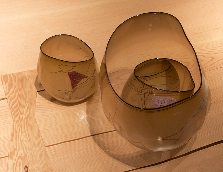 Chihuly bowls on plank